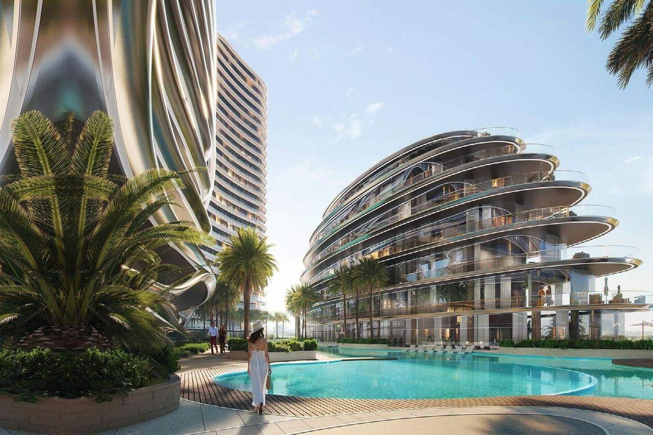 Binghatti Aquarise podium pool with palm trees and sculptural feature