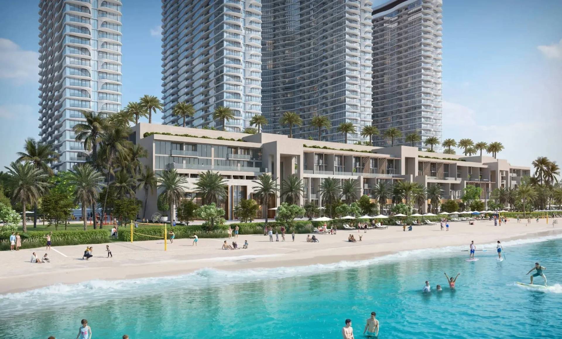 Private sandy beach at Sobha Aquacrest with a beach club, volleyball court and paddleboarding in the turquoise lagoon