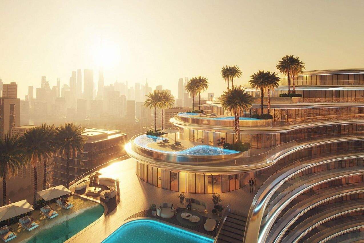 Binghatti Aquarise rooftop private pools overlooking the Dubai skyline at sunset
