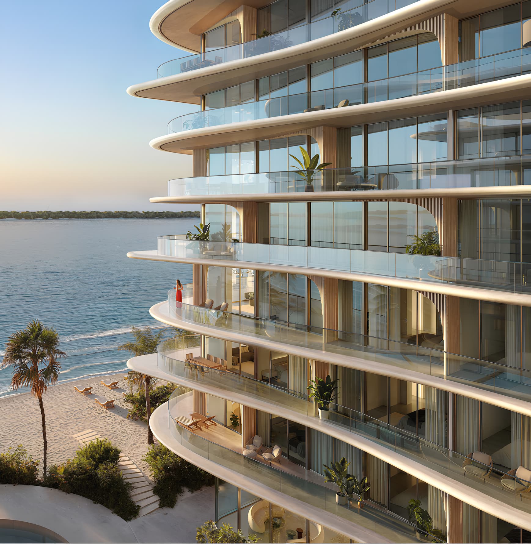 Close-up of AYA's undulating balconies above the beach and turquoise sea